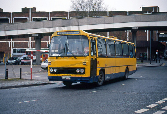 Motts (Yellow Bus) of Stoke Mandeville DDM33X in 4/94